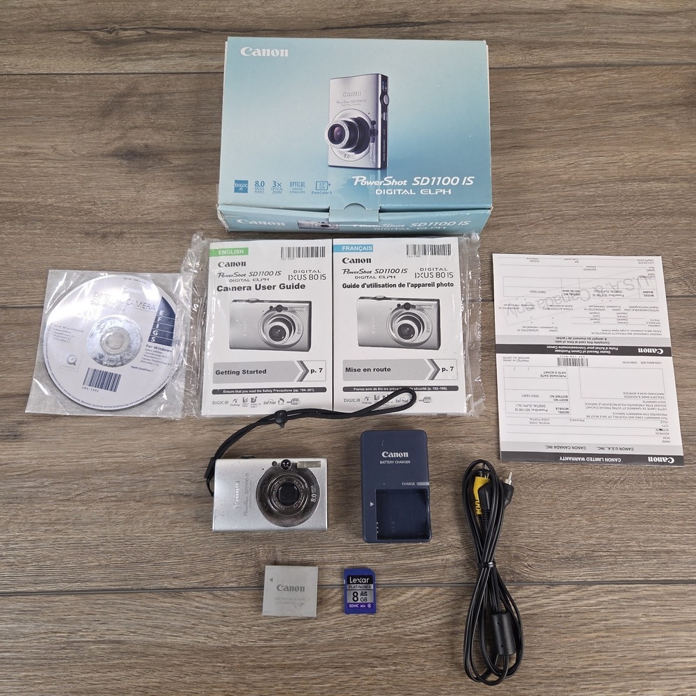 Canon PowerShot Digital ELPH SD1100 IS Digital Camera w/ Box Charger 8GB SD Card